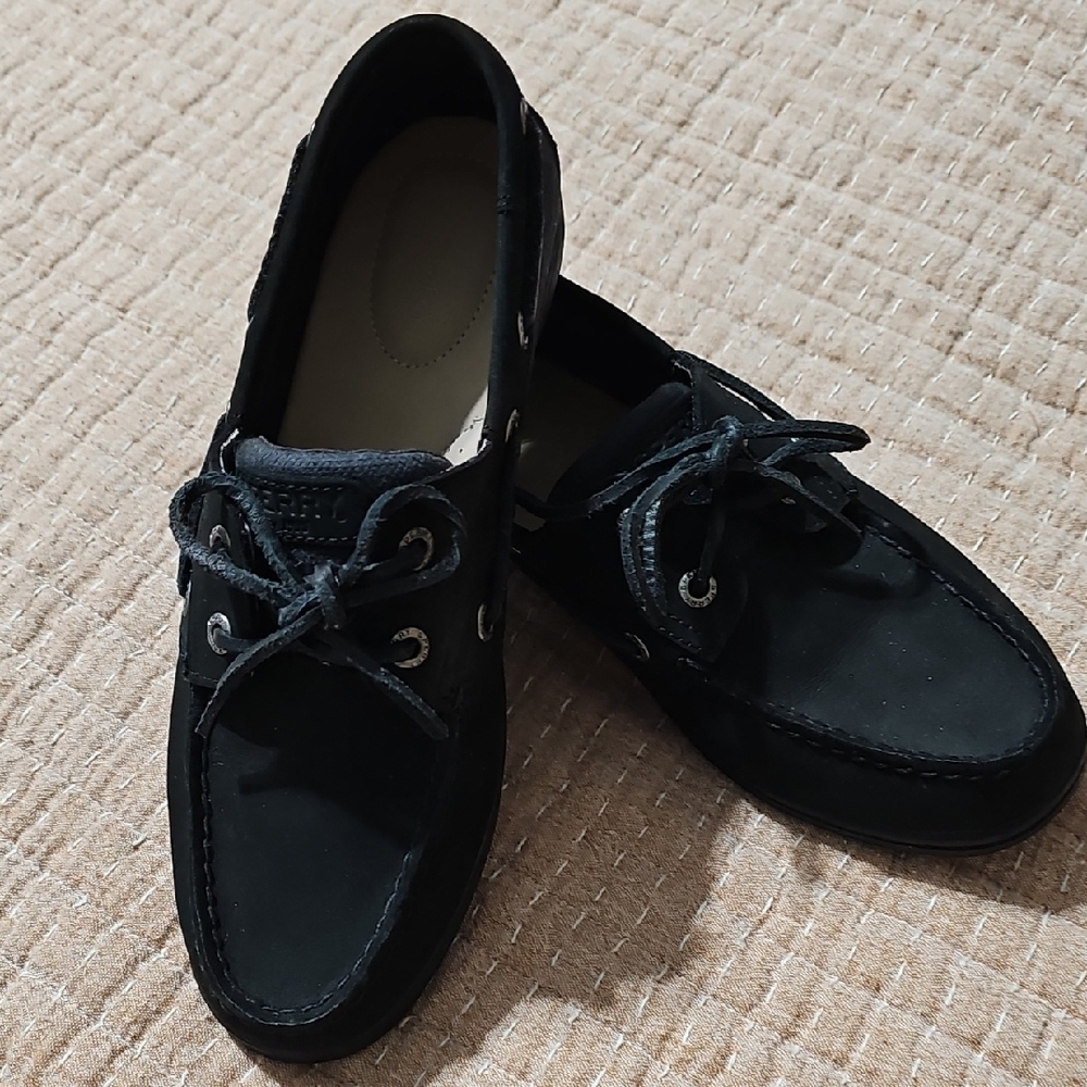Sperry Black Boat Shoes with Moccasin Stitching and Slip-On Design